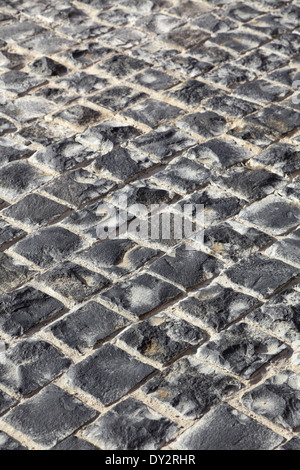 square granite stones on the pavement Stock Photo