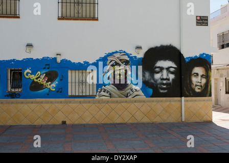 Wall painting of Bob Marley, Jimmy Hendrix and mummy outside on a Record shop in Spain. Stock Photo
