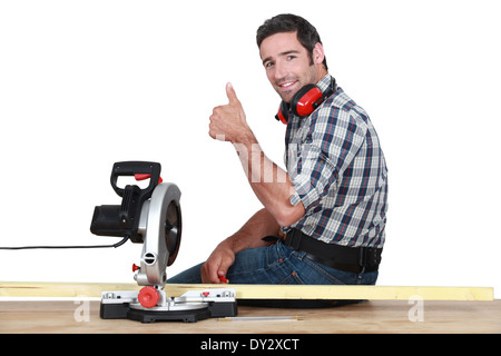 woodworker using circular saw Stock Photo