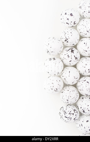 Quail eggs are small and colourful. They can be eaten raw or  cooked and are considered a delicacy in many countries. Stock Photo