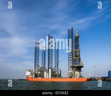 Jack up rig with six legs in Esbjerg oil harbor, Denmark Stock Photo
