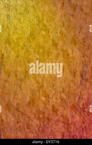 A colored crumpled orange paper texture for background use Stock Photo