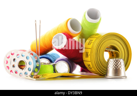 Composition with tailor needles and threads over white background Stock Photo