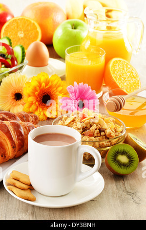 Breakfast with coffee, juice, croissant, salad, muesli and egg. Swedish buffet Stock Photo