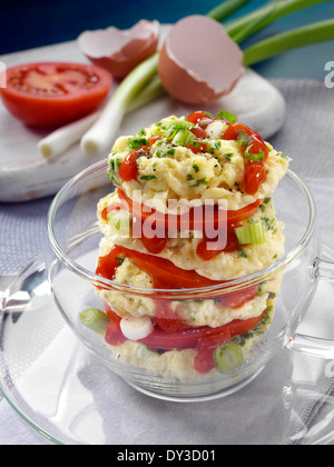 Herb omelette stack cooked in a glass cup individual portion Stock Photo