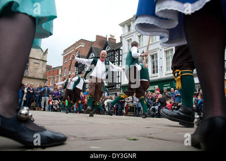 Shrewsbury, Shropshire, UK. 5th April 2014. The Bull and Pump Morris Men entertain the large crowds gathered in The Square in the heart of Shrewsbury, Shropshire. They are just one of many entertainers performing as part of The Big Busk on Saturday 5th April. The Big Busk commemorates the life of busker Guy Benson Bebbington who regularly entertained in the town centre. Known as Ben, he was found with head injuries in September 2012 and two local men were jailed for life for his murder. Credit:  Richard Franklin/Alamy Live News Stock Photo