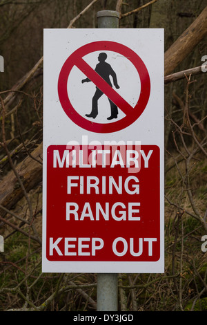 Red UK Army warning sing, crossed through man, Military Firing Range Keep Out. Stock Photo