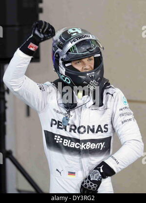 Manama, Bahrain. 06th Apr, 2014. Mercedes' Nico Rosberg celebrates after the qualifying session of the Formula One Bahrain Grand Prix in Manama, Bahrain, on April 5, 2014. Rosberg took the pole position with 1 minute and 33.185 seconds. Credit:  Xinhua/Alamy Live News Stock Photo