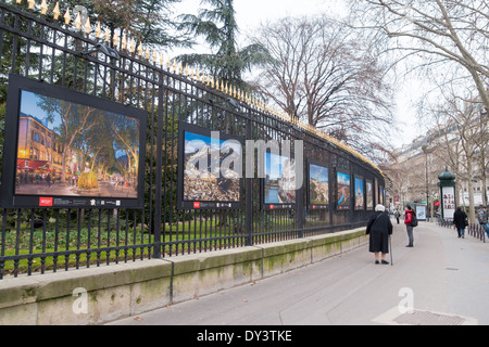 Photography exhibition '[Patrimoines L'Histoire en Mouvement]' on the iron railings of the Jardin du Luxembourg, Paris, France Stock Photo