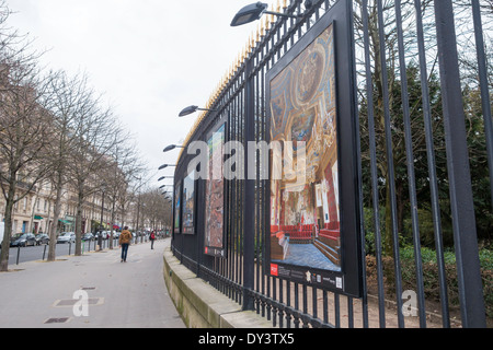 Photography exhibition '[Patrimoines L'Histoire en Mouvement]' on the iron railings of the Jardin du Luxembourg, Paris, France Stock Photo