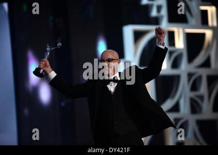 Panama City, Panama. 5th Apr, 2014. Argentinean composer Emilio Kauderer reacts after receiving the Best Original Music Award during the first edition of the Ibero-American Cinema Platinum Awards, in Panama City, capital of Panama, on April 5, 2014. Credit:  Mauricio Valenzuela/Xinhua/Alamy Live News Stock Photo