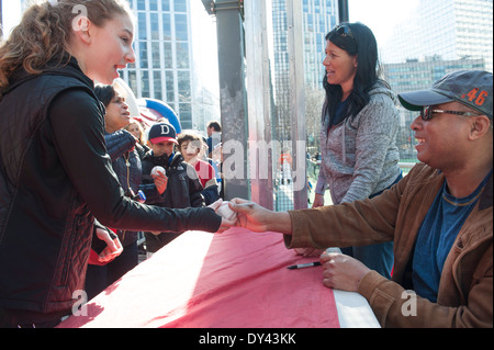 Bernie Williams, All-Star player for the New York Yankees, signing autographs at the opening of the Downtown Little League. Stock Photo