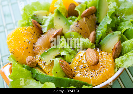Summery Citrus Salad with almonds and lemon poppy seed dressing Stock Photo