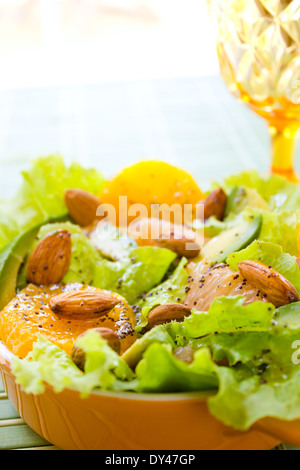 Summery Citrus Salad with almonds and lemon poppy seed dressing Stock Photo