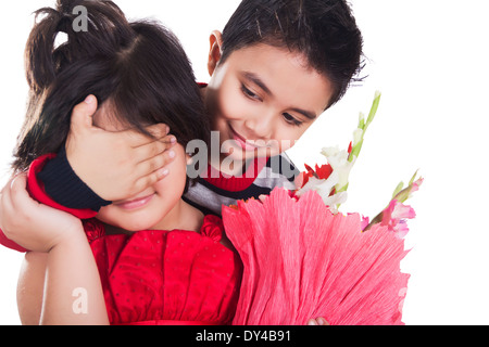 Indian Kids Couple Bouquet  Presents Stock Photo