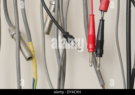 mass of electrical wires cables used for testing experiments phono jack mono stereo earthed screened vga audio xlr Stock Photo