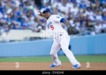 Los Angeles, CA, USA. 6th Apr, 2014. April 6, 2014 - Los Angeles, CA, United States of America - Los Angeles Dodgers third baseman Juan Uribe (5) throws the ball to first base during the MLB game between San Francisco Giants and Los Angeles Dodgers at the Dodgers Stadium in Los Angeles, CA. © csm/Alamy Live News Stock Photo