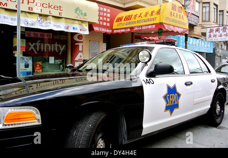 San Franisco police car parked in front of chinese restaurant in North Beach Stock Photo