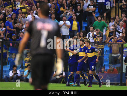 Buenos Aires, Argentina. 6th Apr, 2014. Players of Boca Juniors celebrate the team's scoring during the match of the 2014 Final Tournament against Godoy Cruz at Alberto J. Armando Stadium in Buenos Aires, capital of Argentina, on April 6, 2014. © Martin Zabala/Xinhua/Alamy Live News Stock Photo