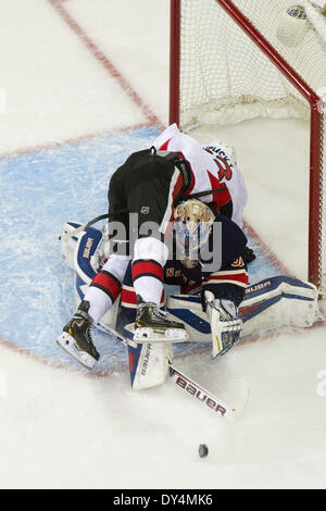 Manhattan, New York, USA. 7th Apr, 2014. April 5, 2014 - Manhattan, New York, U.S - April 05, 2014: Ottawa Senators right wing Ales Hemsky (83) tumbles over New York Rangers goalie Henrik Lundqvist (30) as he attempts to swat away the puck during the game between The New York Rangers and The Ottawa Senators at Madison Square Garden in Manhattan, New York . © csm/Alamy Live News Stock Photo