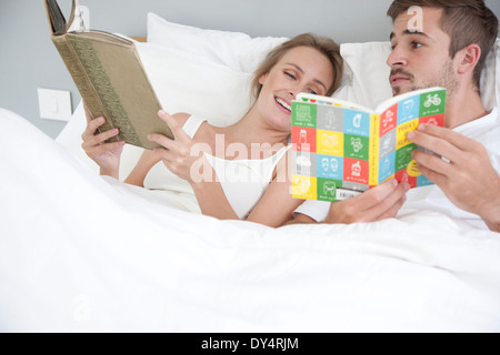 Couple in Bed Reading