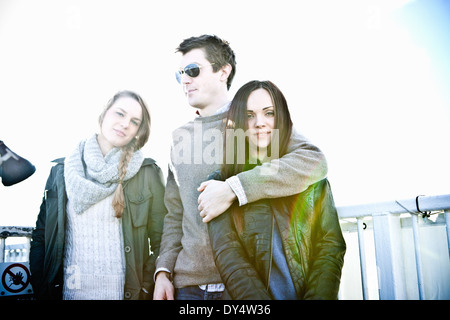 Portrait of one male and two female adult friends Stock Photo