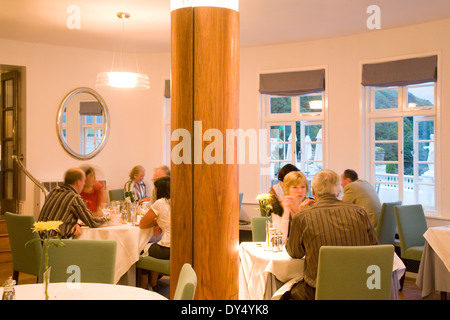 Portmeirion hotel restaurant, guests at dinner. Portmeirion, North Wales, United Kingdom Stock Photo