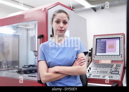 Portrait of female engineer in computer room Stock Photo