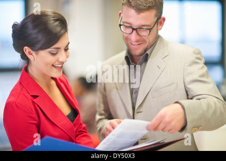 Young businesswoman presenting ideas to colleague Stock Photo