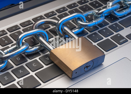 Computer on line security illustrated by a padlock and chain Stock Photo