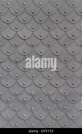 metal armor fish scale with rivets seamless background Stock Photo