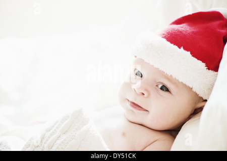 Portrait of baby boy in santa hat Stock Photo