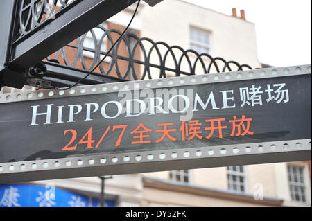 Chinatown, London, UK. 7th April 2014. Signs in Chinese on the Hippodrome 24/7 casino in Chinatown. Credit:  Matthew Chattle/Alamy Live News Stock Photo
