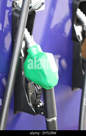 Fuel dispenser for refueling in gas station. Stock Photo