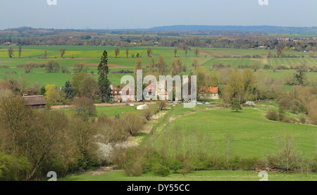 A Landscape in Rural Oxfordshire with fields and meadows with the Hamlet of Little Wittenham in the distance Stock Photo