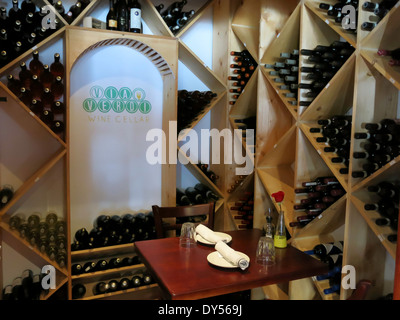 Romantic Wine Cellar Table For Two,Via Verdi Cucina Rustica, Miami, FL Stock Photo