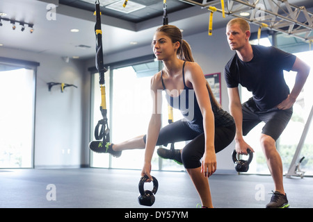 Couple working out with weights Stock Photo