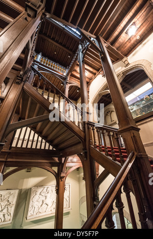BRUSSELS, Belgium — Internal wooden staircase at the Museum of the City of Brussels. The museum is dedicated to the history and folklore of the town of Brussels, its development from its beginnings to today, which it presents through paintings, sculptures, tapistries, engravings, photos and models. The Museum of the City of Brussels, housed in the historic Maison du Roi building, offers visitors a fascinating insight into the city's rich history and culture. Stock Photo