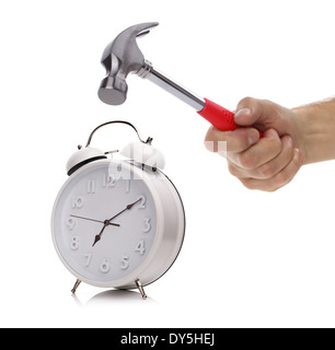 Alarm clock and hammer Stock Photo
