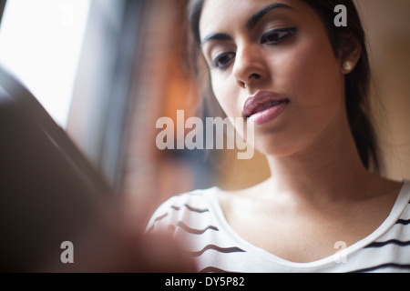 Young woman using laptop computer Stock Photo