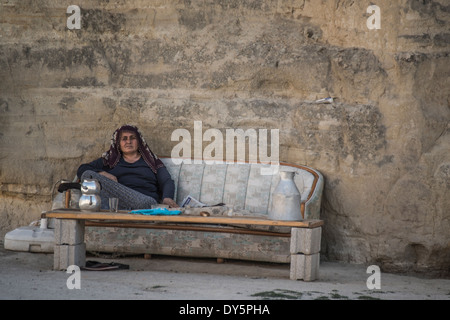 Local woman selling tea for turists near the open museum in Cappadocia Stock Photo