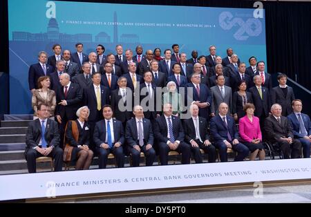 Washington, DC, USA. 11th Apr, 2014. Finance ministers and central bankers of the G20 pose for a family photo with IMF Managing Director Christine Lagarde (2nd L, front) during the IMF and World Bank spring meetings in Washington, DC, capital of the United States, April 11, 2014. Credit:  Yin Bogu/Xinhua/Alamy Live News Stock Photo