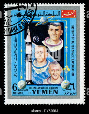 YEMEN - CIRCA 1980s: a stamp printed by Yemen shows cosmonauts (APPOLO 7, OCTOBER 11, 1969), circa 1980s Stock Photo