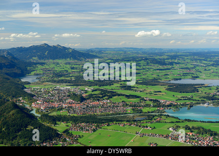 View towards Fuessen, Allgaeu range, lake Weissensee, lake Forggensee and lake Bannwaldsee, Tegelberg, Ammergau range, Allgaeu, Stock Photo