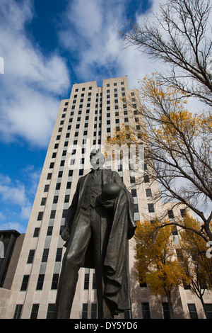 USA, North Dakota, Bismarck, North Dakota State Capitol exterior with statue of John Burke, former governor Stock Photo