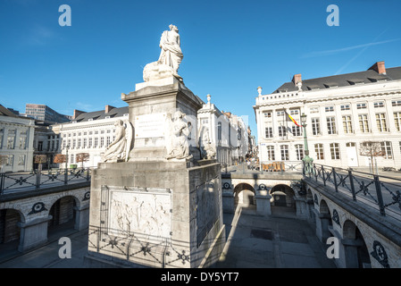 BRUSSELS, Belgium — Place des Martyrs serves as the burial site and memorial for those who died during the Belgian Revolution of 1830. The central monument features allegorical sculptures commemorating Belgium's struggle for independence from the Netherlands. The historic square honors 466 revolutionaries who lost their lives in the successful fight for Belgian nationhood. Stock Photo