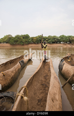 Dugout Canoe in Black Water Stream with tourists, Yasuni ...