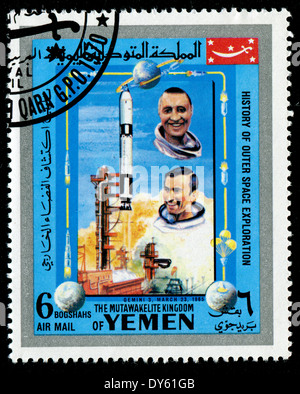 YEMEN - CIRCA 1980s: a stamp printed by Yemen shows cosmonauts (GEMINI 3, MARCH 23, 1965), circa 1980s Stock Photo