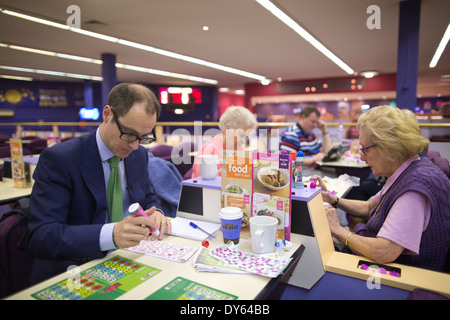 Mecca Bingo UK bingo company. People playing Bingo at Camden Town Bingo Hall, London, UK. Stock Photo