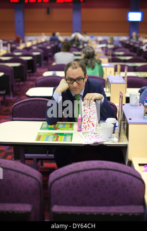 Mecca Bingo UK bingo company. People playing Bingo at Camden Town Bingo Hall, London, UK. Stock Photo